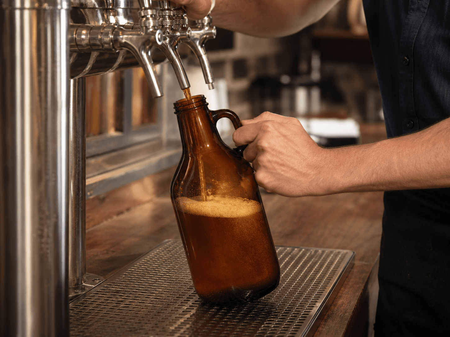 Growler used for beer poured from a tap into a jug in a taproom fills setting