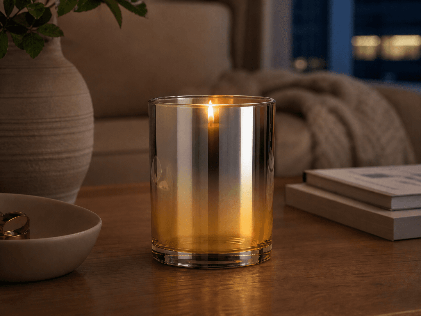 Electroplated Gradient Candle Jar used for a candle lit for four hours at a time in a long evenings setting