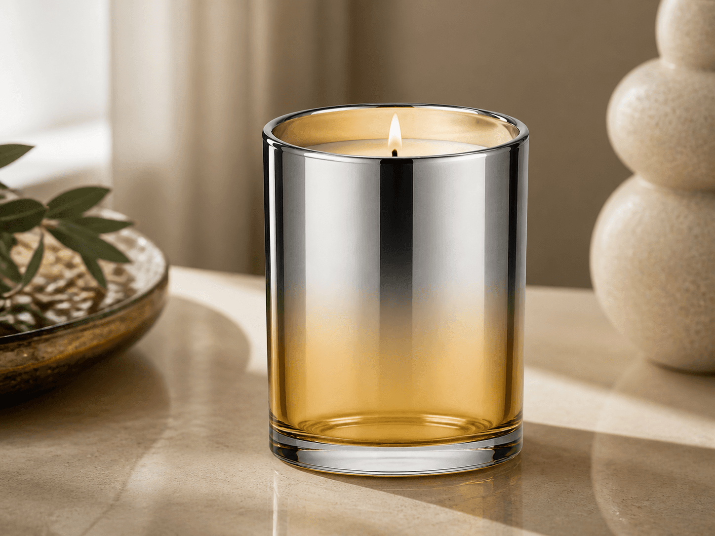 Electroplated Gradient Candle Jar used for metallic families across a fragrance range in a collections setting