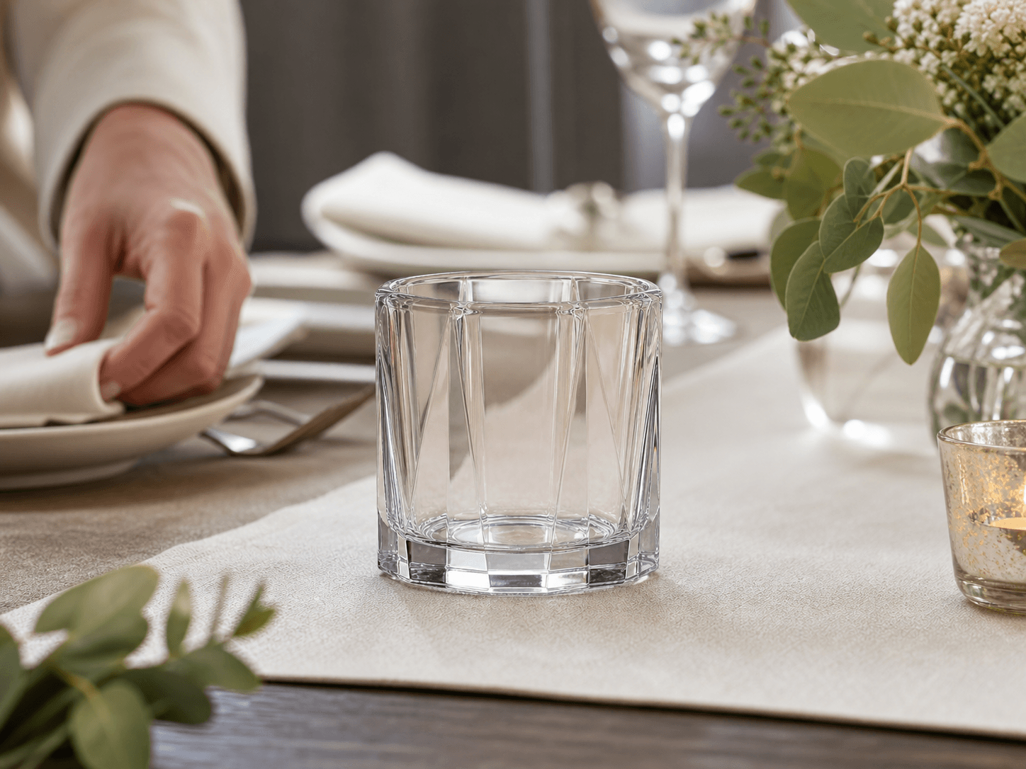 Geometric Faceted Candle Jar used for corners a guest looks straight through in a unlit on a table setting
