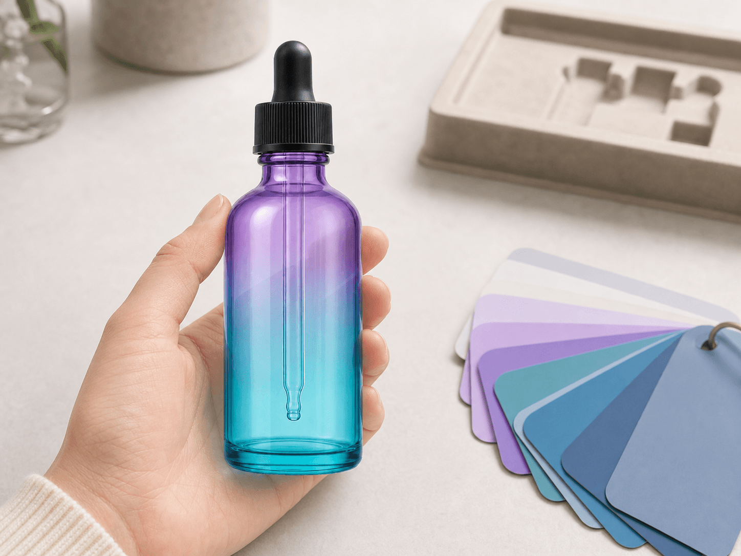 Gradient-tinted Dropper Bottle used for multi-variant treatment lines in a serum ranges setting