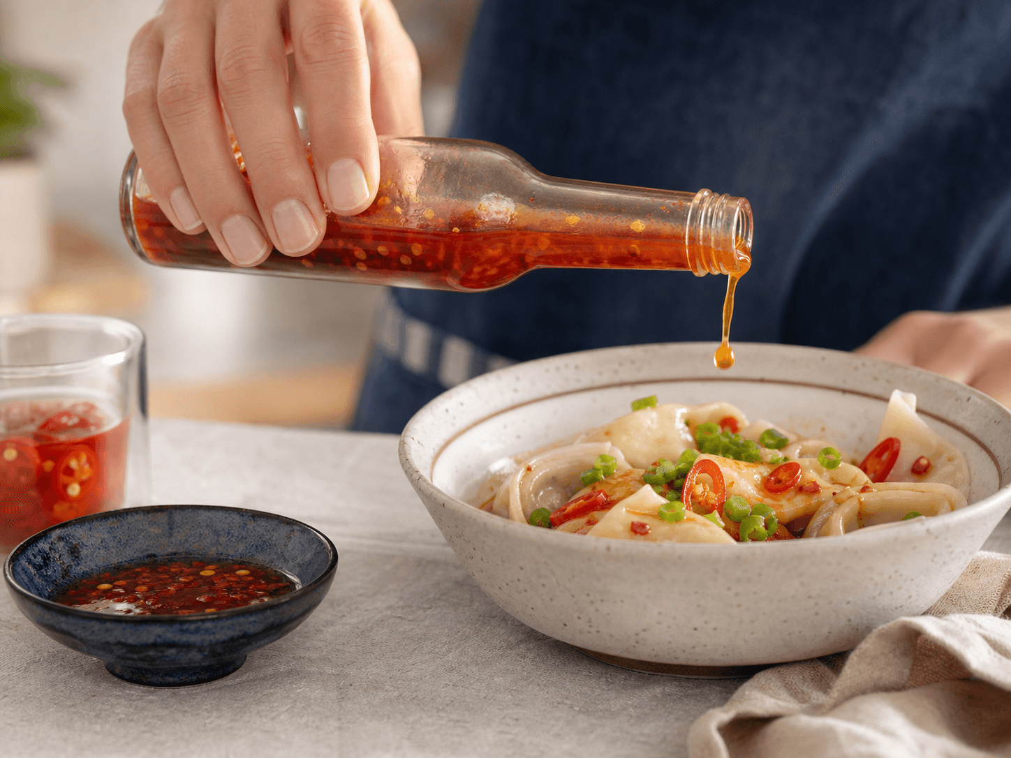 Chili Sauce Bottle used for vinegar-forward chili & pepper sauce in a bright condiments setting