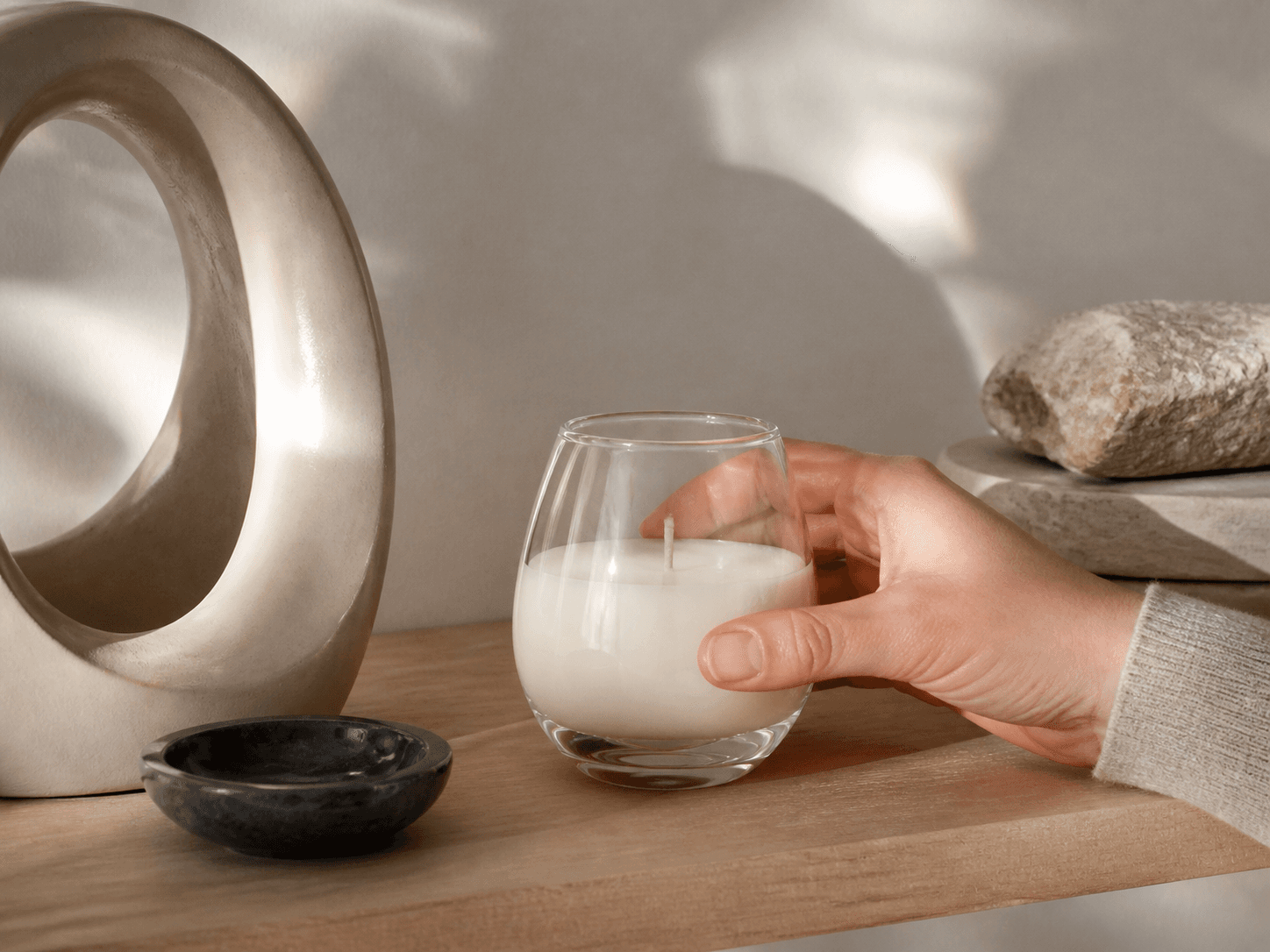 Egg-shaped Candle Vessel used for candles displayed as small objects in a sculptural pieces setting
