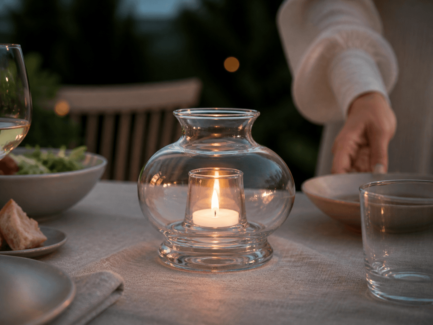 Oil Lamp / Candle Holder used for steady flames on a dining or terrace table in a table lighting setting