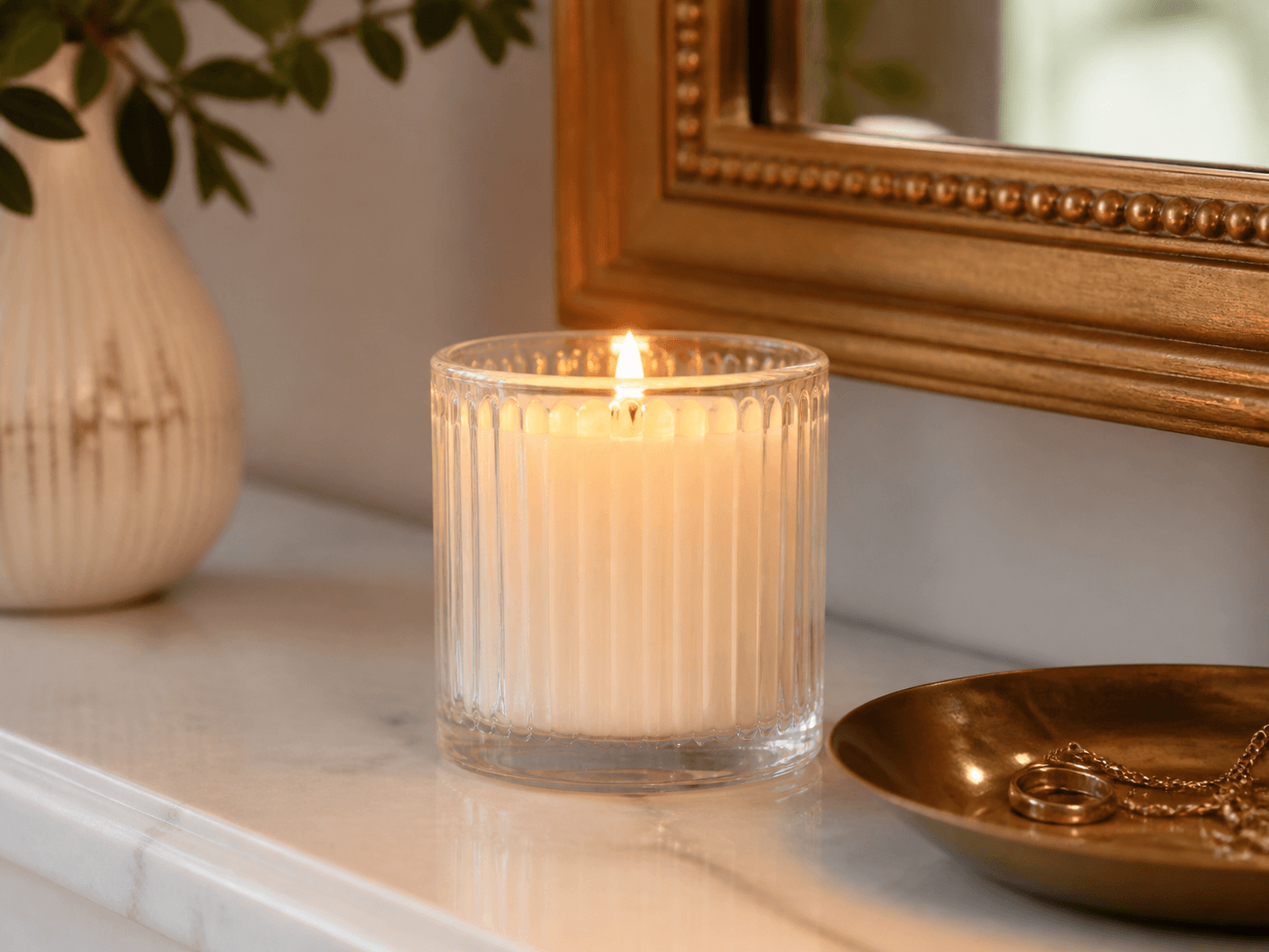 Ribbed / Column Candle Jar used for column candles for a mantel or dresser in a classic ambience setting