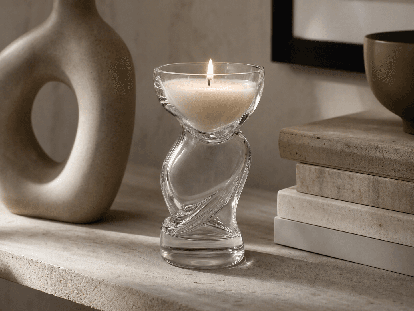 Sculptural / Figurine Vessel used for candles chosen as sculpture in a design objects setting
