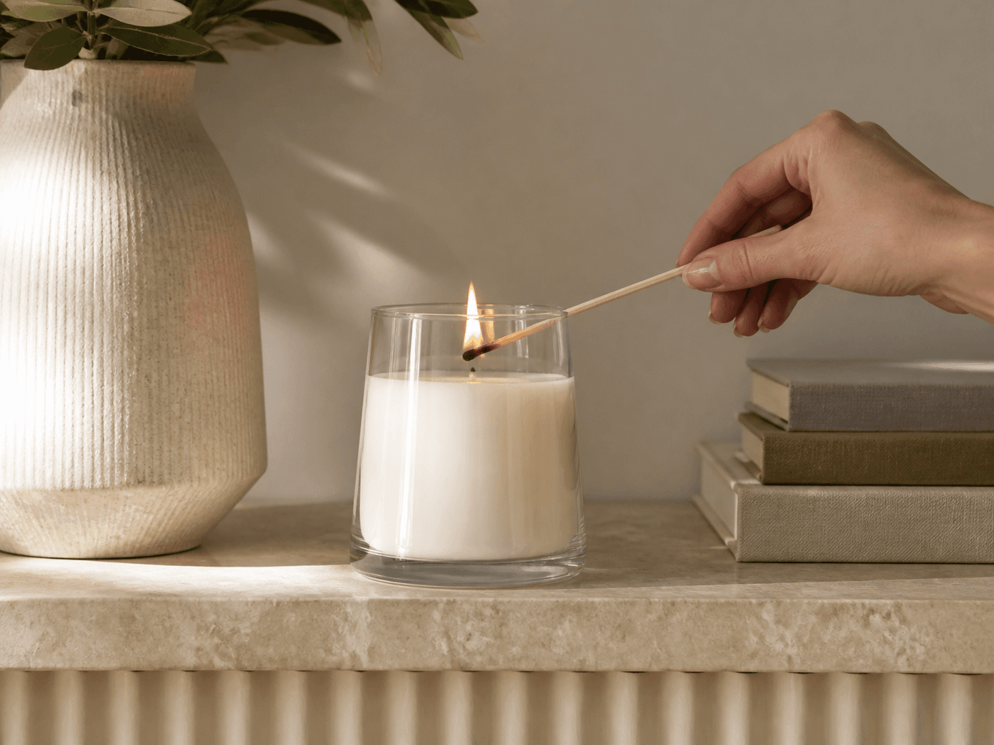 Tapered Candle Jar used for sculptural vessels for a shelf in a signature candles setting