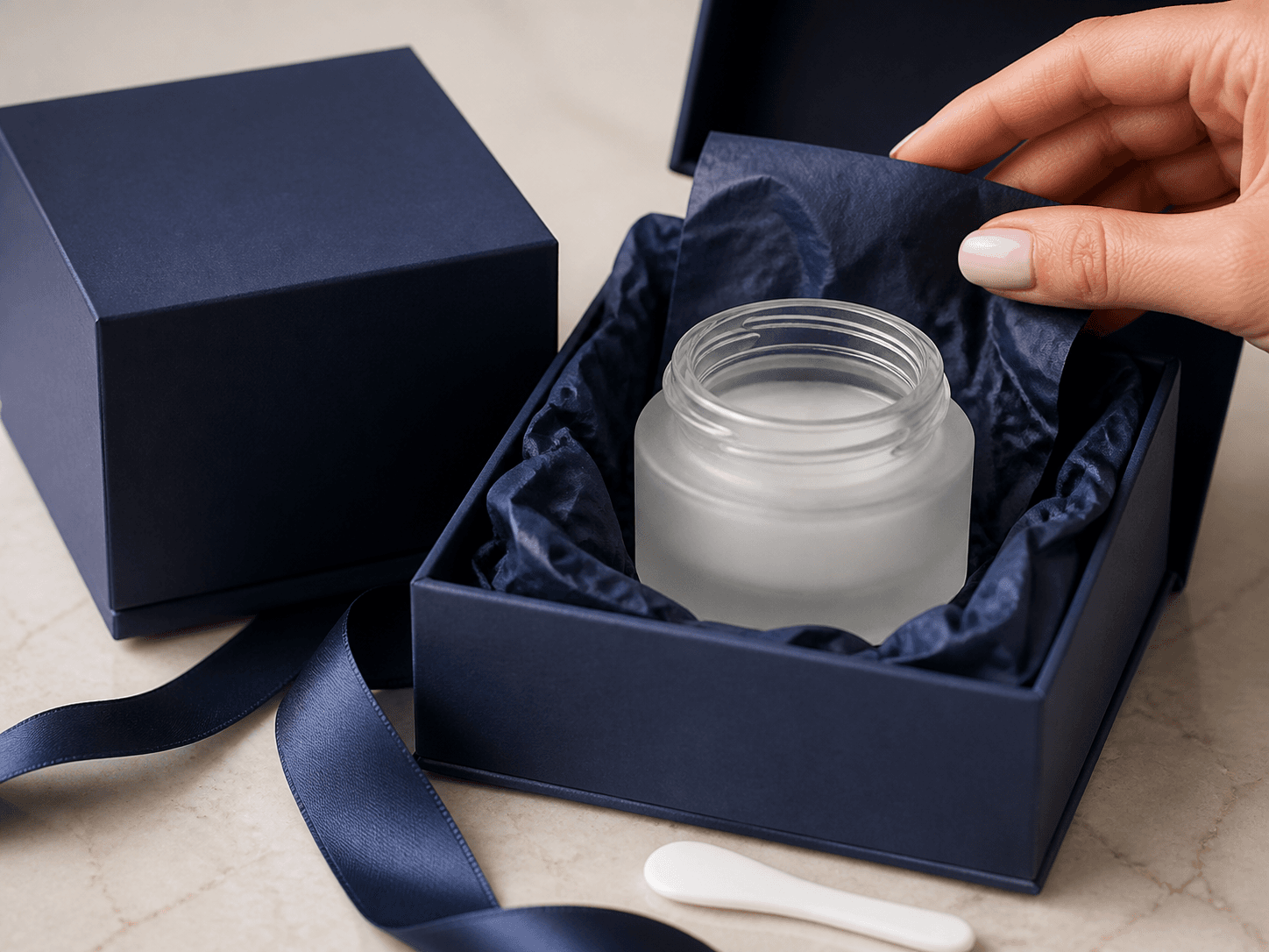 Eye Cream Jar used for companion sizes beside a face cream in a range and gifting setting