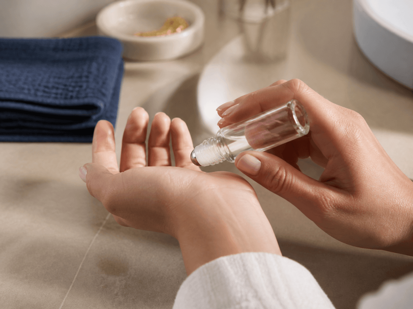 Roller Ball Bottle used for pulse-point and blemish treatments in a targeted care setting