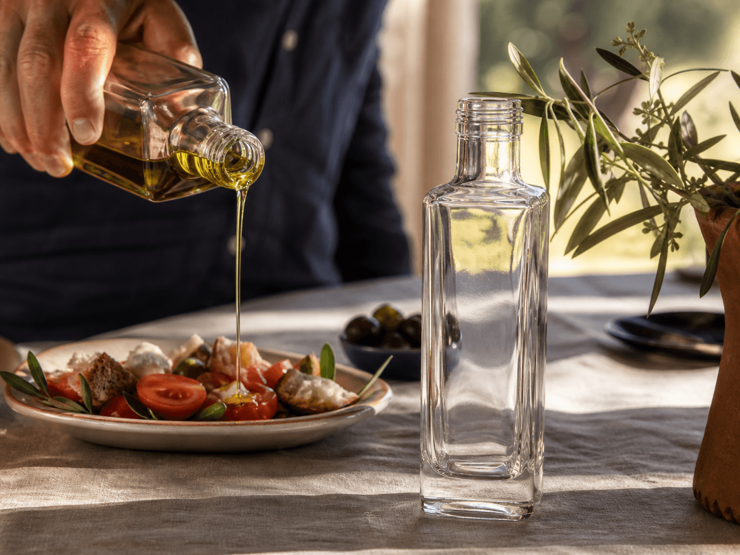 Olive Oil Bottle used for extra-virgin & single-cultivar olive oils in a estate release setting