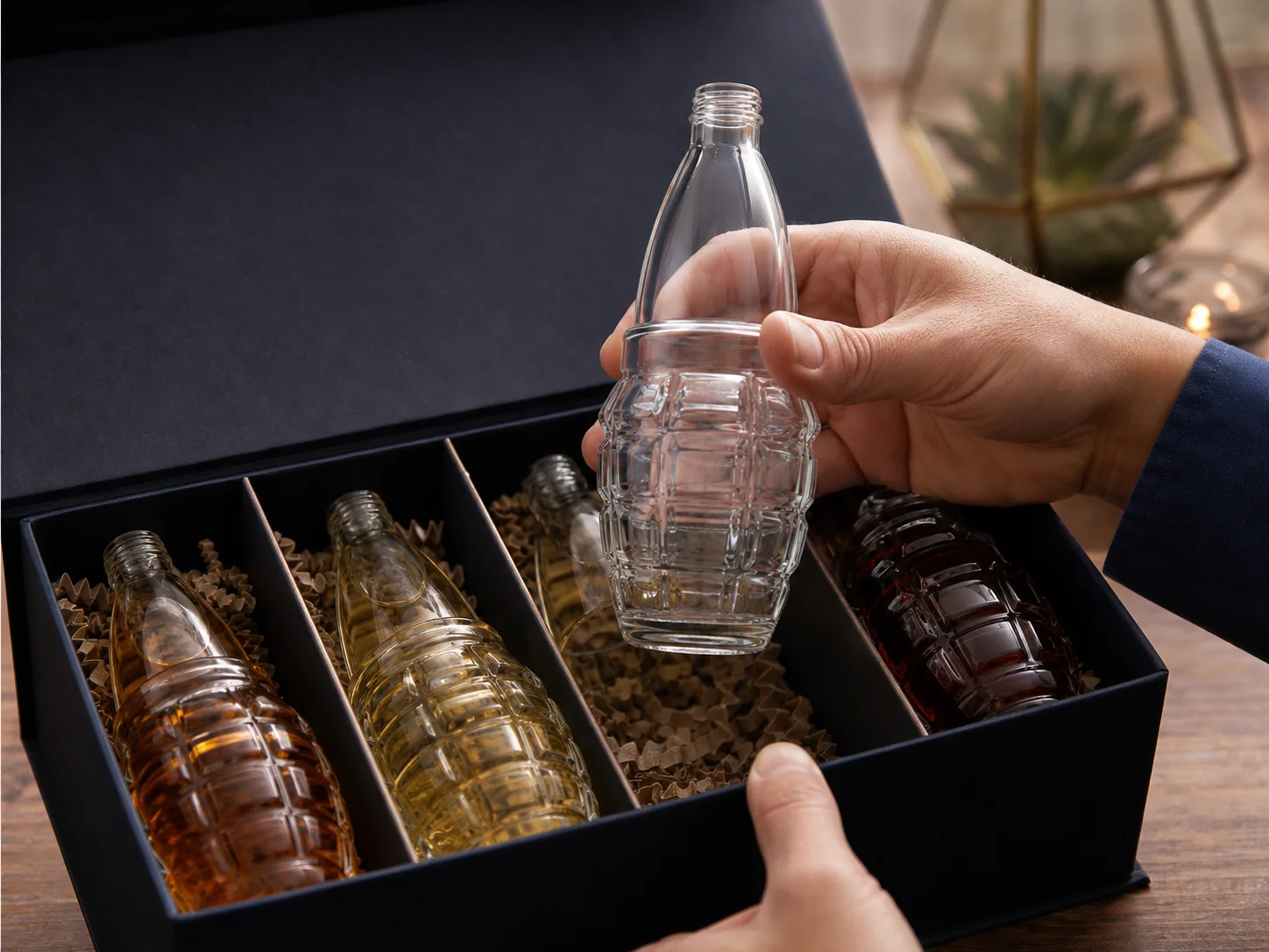 Bouteille fantaisie en forme de munition intégrée à un coffret de miniatures ou un multipack cadeau