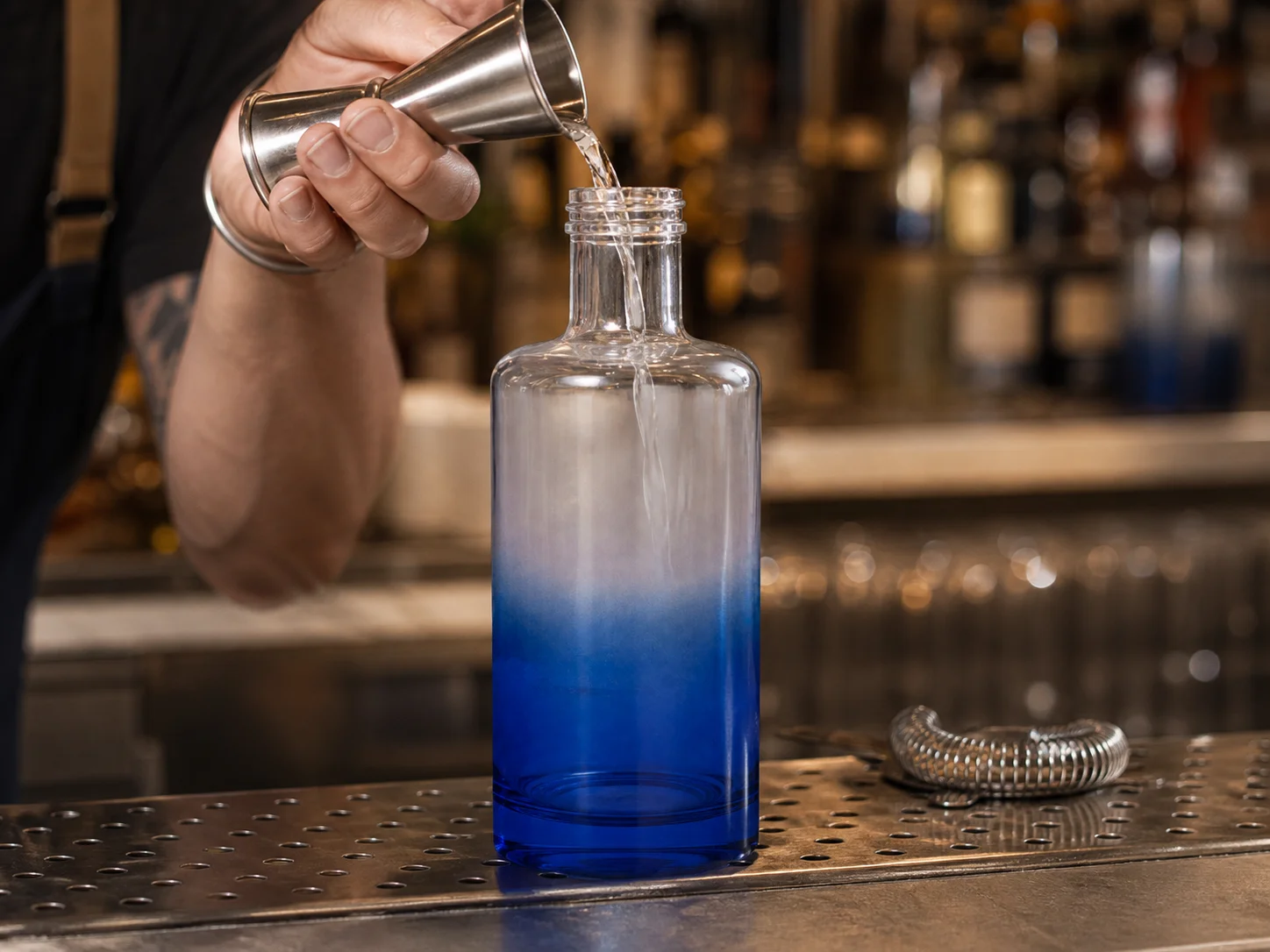 Bouteille à dégradé pulvérisé pour une gamme de variantes et de saveurs